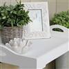 White wooden tray on stand