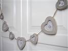 Natural heart photo frames in a garland