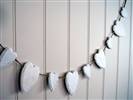 Distressed white wooden heart garland
