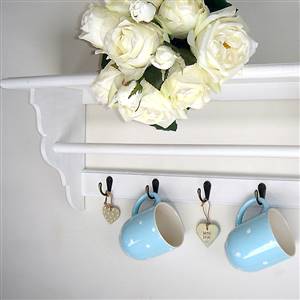 White shelf hooks & towel rail