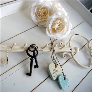 Cream key-shaped key holder