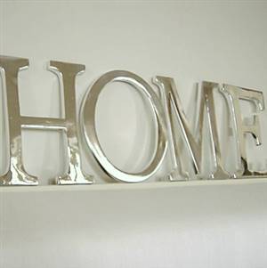 Silver coloured HOME letters