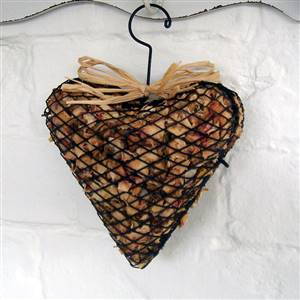 Medium cream rosebud cage heart