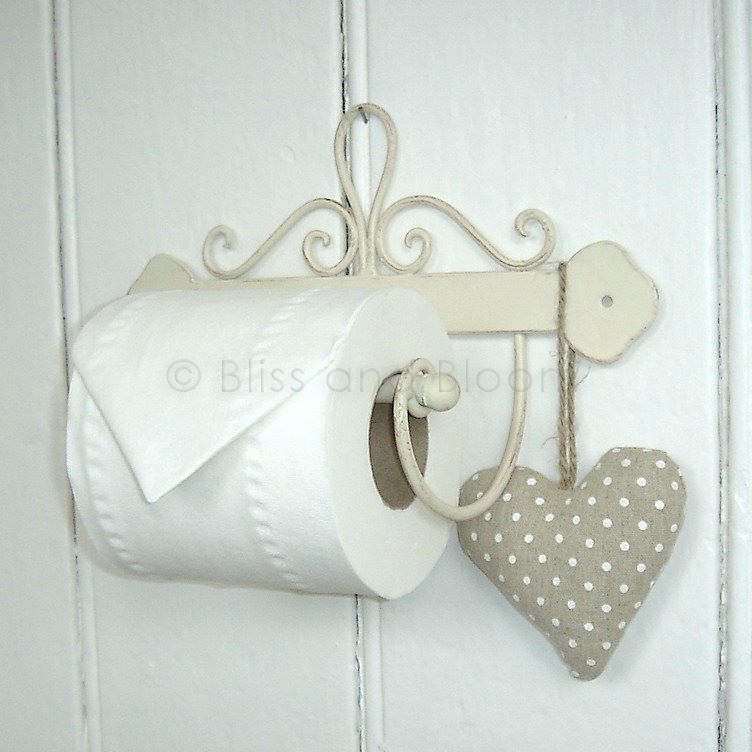 beige toilet roll holder