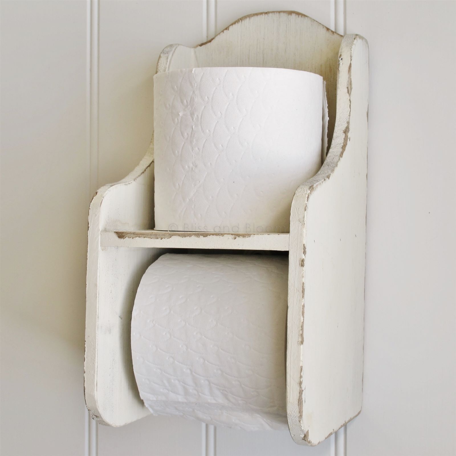 cream toilet roll holder