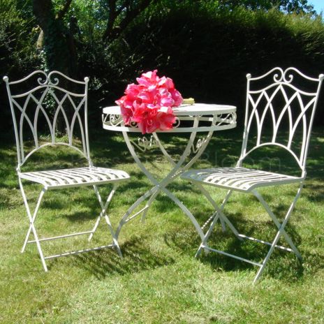 cream wrought iron bistro set