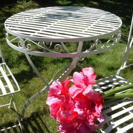 cream wrought iron bistro set